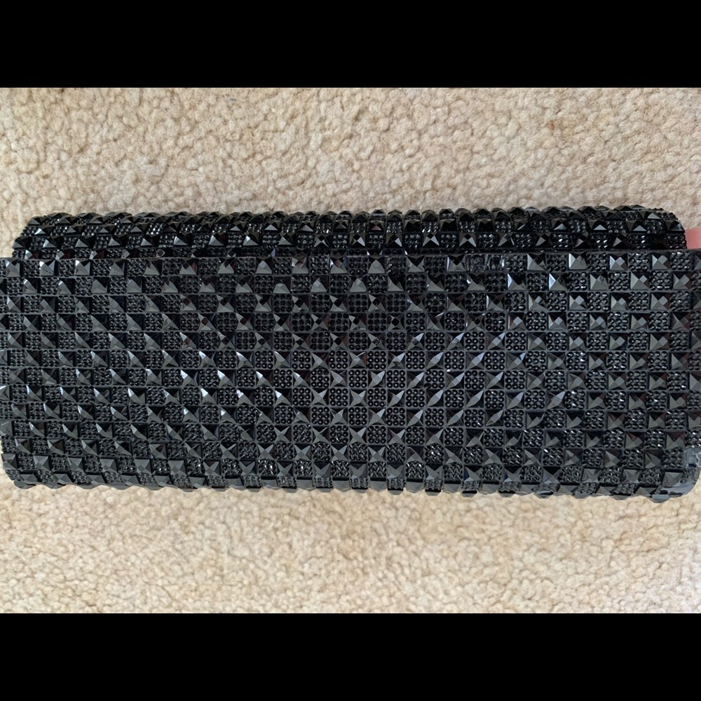 Black studded clutch